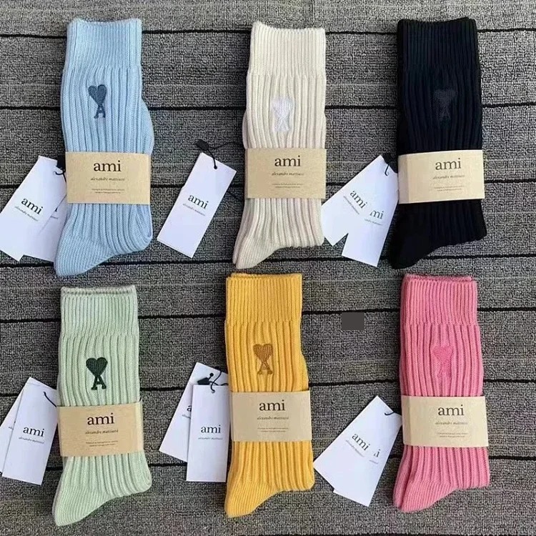 Love solid color Japanese thick line long socks for men and women in autumn and winter mid from OutfitReps